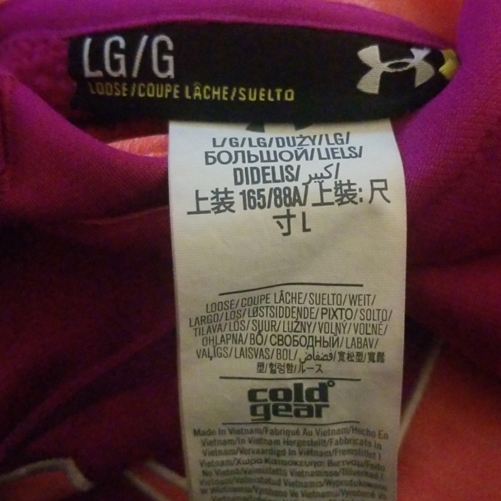 Under armour fuchsia and peach color hoodie